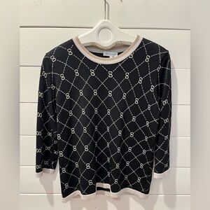 Elegant knit top by Bluoltre, size M/L. Black